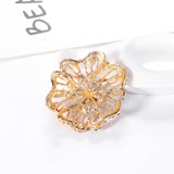 Broche strass ouro