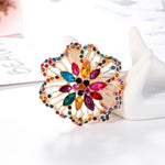 Broche strass ouro