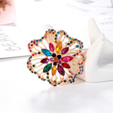 Broche strass ouro