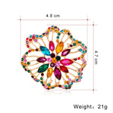 Broche strass ouro