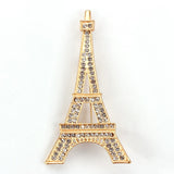 Broche torre eiffel ouro