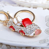 Chaveiro brilhante carro vermelho