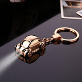 Chaveiro com lanterna led ouro