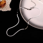 Choker prata título por defeito