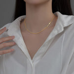 Colar cruz choker
