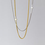 Colar cruz choker