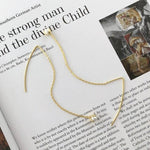 Colar dourado de pérolas brincos