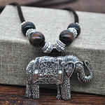 Colar elefante tibetano valor por defeito título