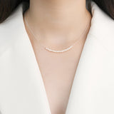 Colar elegante com pequenas pérolas