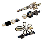 Conjunto de 5 ganchos de cabelo pretos e dourados valor por defeito título