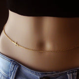 Corrente cintura com cruz ouro