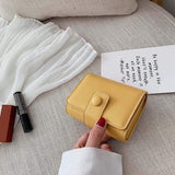 Estojo de maquilhagem feminino amarelo