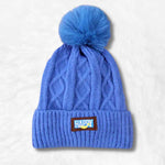Gorro azul com pompon título por defeito