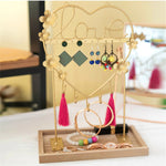 Porta-brincos dourado título por defeito