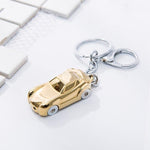 Porta-chaves carro de luxo ouro