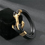 Pulseira âncora de couro dourada preto