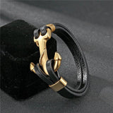 Pulseira âncora de couro dourada preto