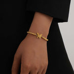 Pulseira borboleta com pérolas valor por defeito título