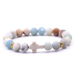 Pulseira com cruz pérolas coloridas valor por defeito título