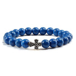 Pulseira com cruz pérolas de pedra azul escuro