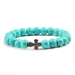 Pulseira com cruz pérolas de pedra azul turquesa