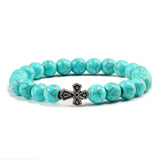 Pulseira com cruz pérolas de pedra azul turquesa