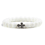 Pulseira com cruz pérolas de pedra porcelana branca