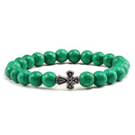 Pulseira com cruz pérolas de pedra verde escuro