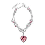 Pulseira com pendente de coração rosa tipo