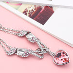 Pulseira com pendente de coração rosa tipo
