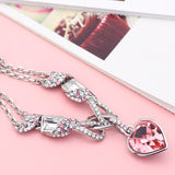 Pulseira com pendente de coração rosa tipo