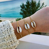 Pulseira concha dourada título por defeito