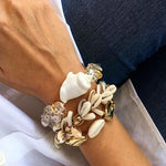 Pulseira conchas do taiti título por defeito