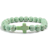 Pulseira cruz católica verde-maçã
