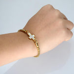 Pulseira cruz cristã dourada valor por defeito título