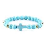 Pulseira cruz minimalista azul celeste/dourado