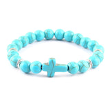 Pulseira cruz minimalista azul celeste/prata