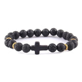 Pulseira cruz minimalista pedra de lava preta/dourada