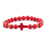 Pulseira cruz minimalista vermelho/dourado