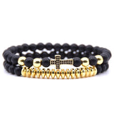 Pulseira cruz ónix ouro