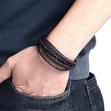 Pulseira de couro com pérolas pretas