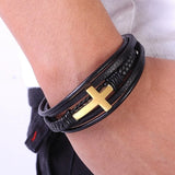 Pulseira de couro cruz dourada