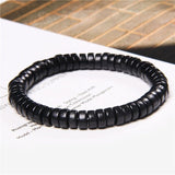 Pulseira de madeira nórdica preta