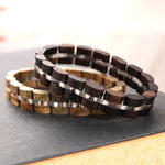 Pulseira de madeira preta e prata valor por defeito título