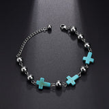 Pulseira feminina com pequenas cruzes prata