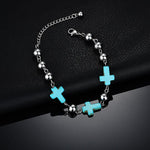 Pulseira feminina com pequenas cruzes prata