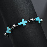 Pulseira feminina com pequenas cruzes prata