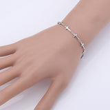 Pulseira feminina cruz em metal