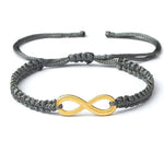 Pulseira infinito cinzenta e dourada valor por defeito título
