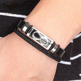 Pulseira infinito de couro e aço